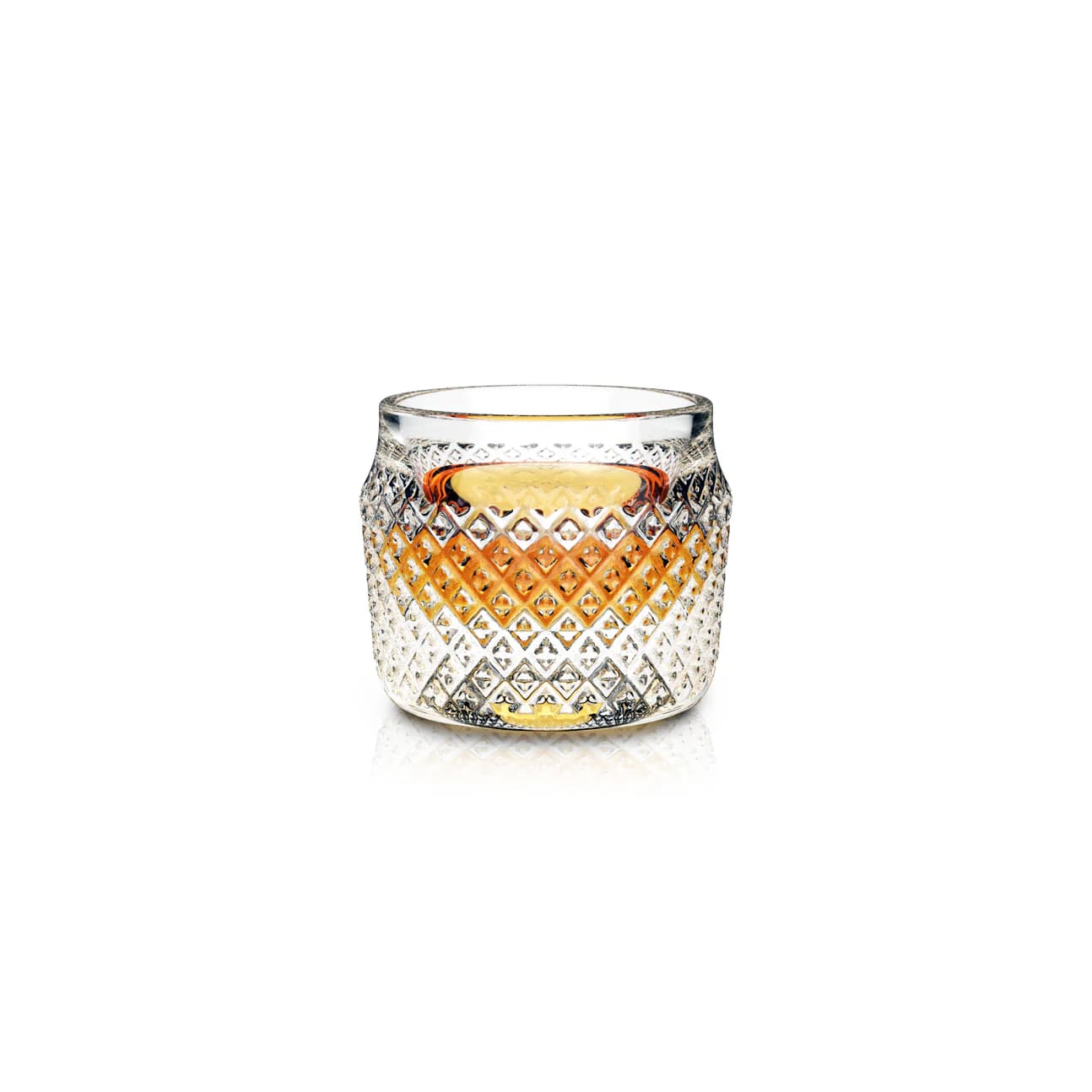 Aged & Ore clear crystal Sip Glass with a diamond-cut pattern, holding bourbon over ice