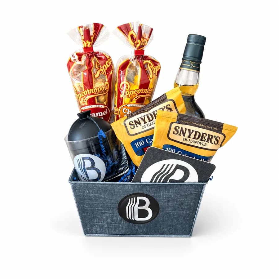 BroBasket Buffalo Trace bourbon gift basket with a 750ml bottle, rocks glass, ice mold, and snacks