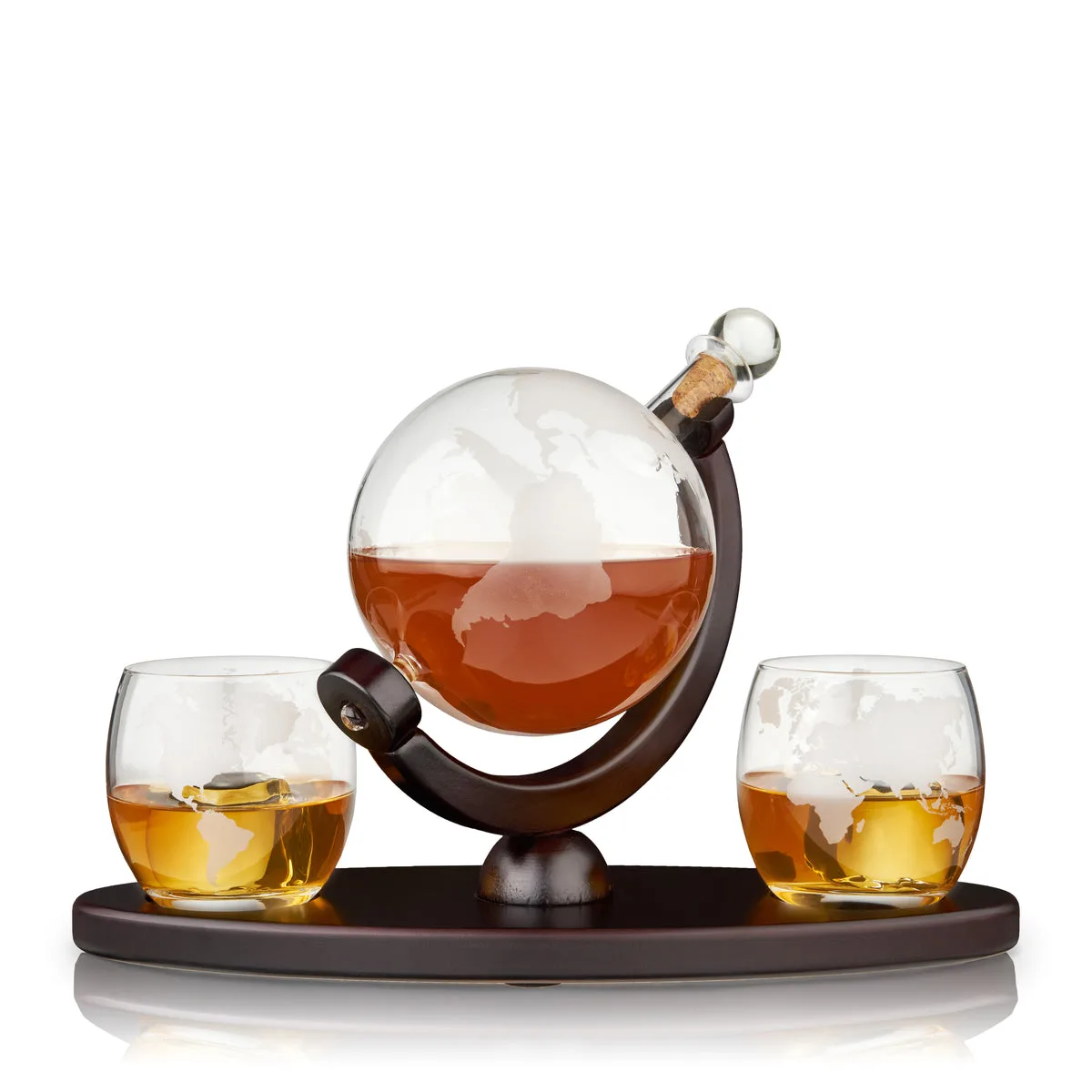 Viski globe decanter etched with the continents on a wooden stand, with two matching whiskey tumblers